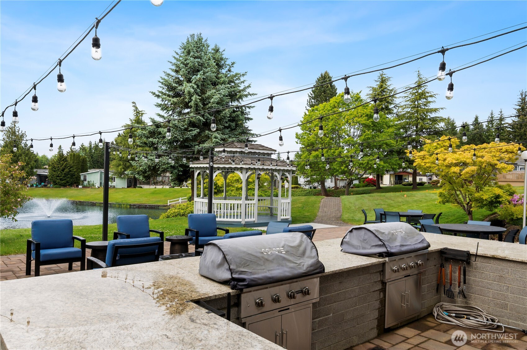 1427 100th Street Southwest, Unit 145 Everett, WA 98204 - Photo 6 of 36 a view of yard with seating area and green space