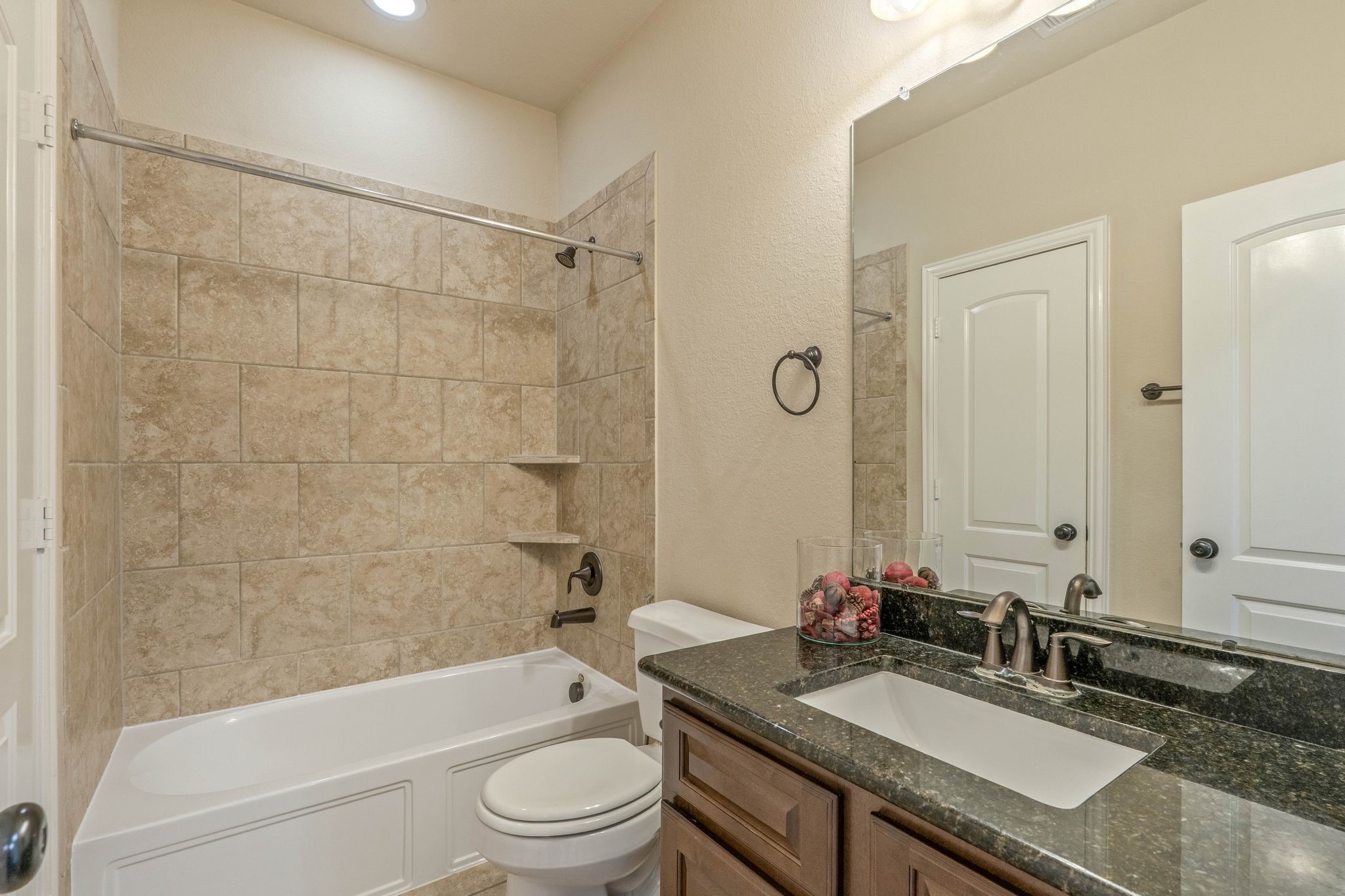 166 Lindenberry Circle Tomball, TX 77375 - Photo 31 of 43 En-suite bath to one of the secondary bedrooms!