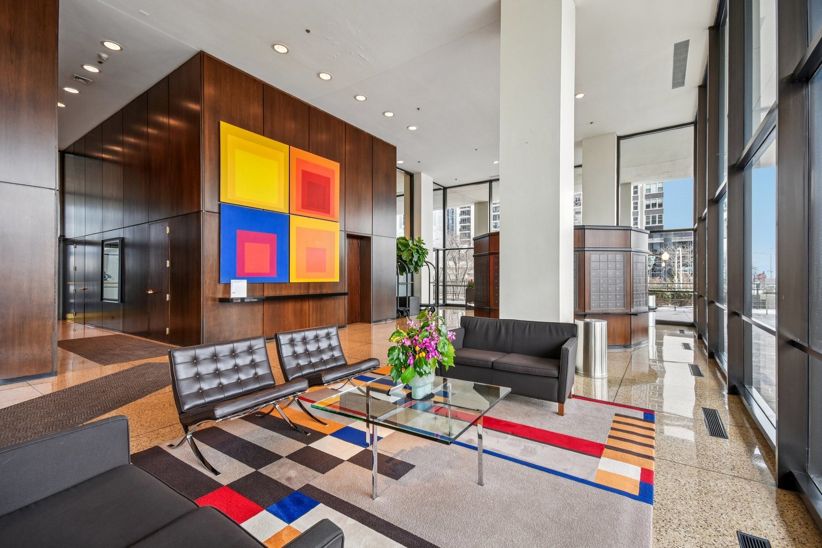 360 East Randolph Street, Unit 1102 Chicago, IL 60601 - Photo 20 of 27 a living room with patio furniture and a flat screen tv