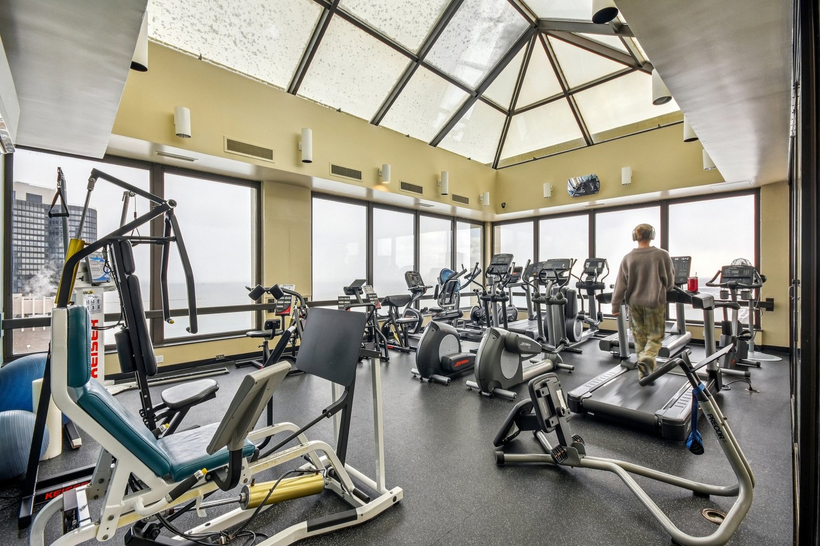 360 East Randolph Street, Unit 1102 Chicago, IL 60601 - Photo 21 of 27 a view of a room with gym equipment