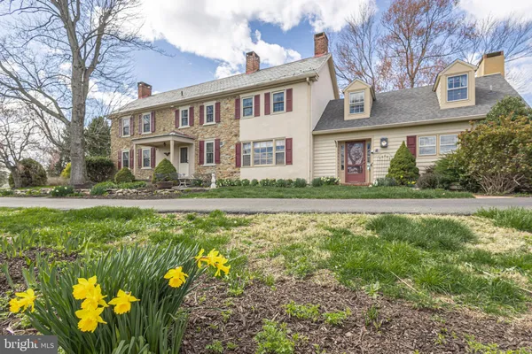 a front view of a house with swimming pool