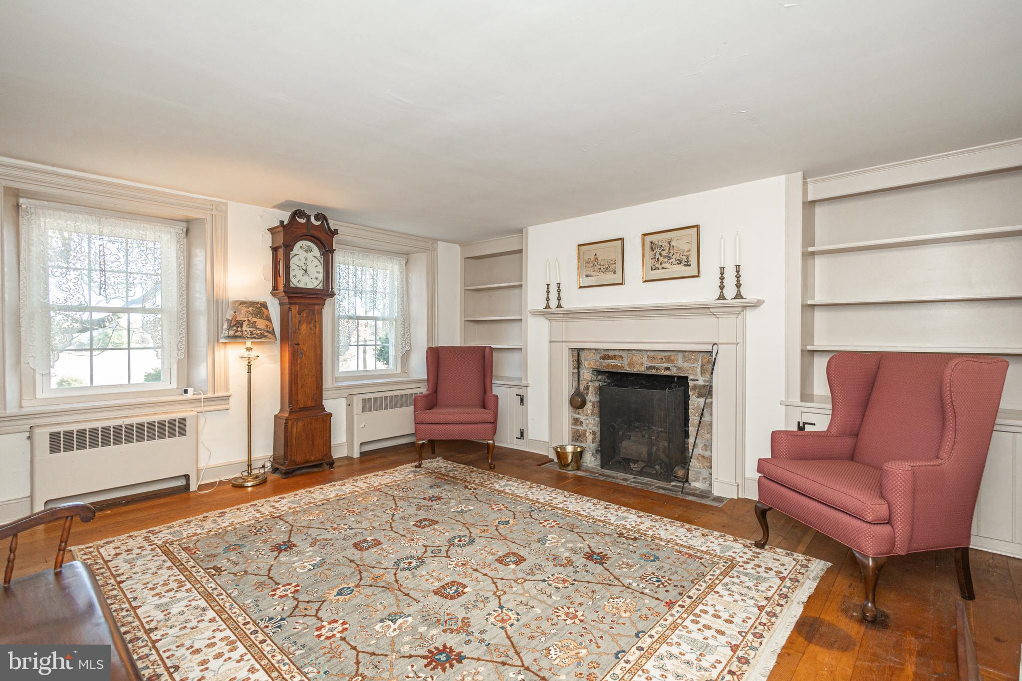 2209 Swamp Road Furlong, PA 18925 - Photo 12 of 59 a living room with furniture rug and window