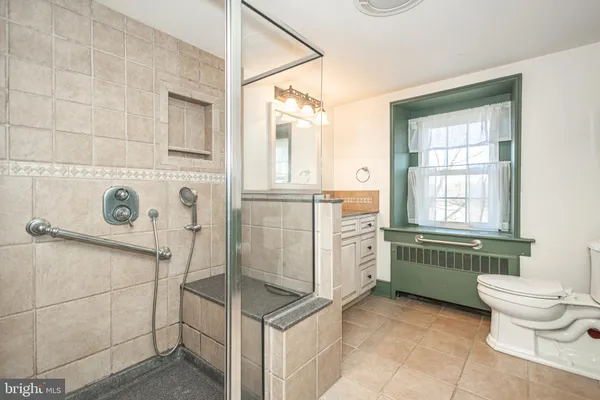 a view of a door and a window