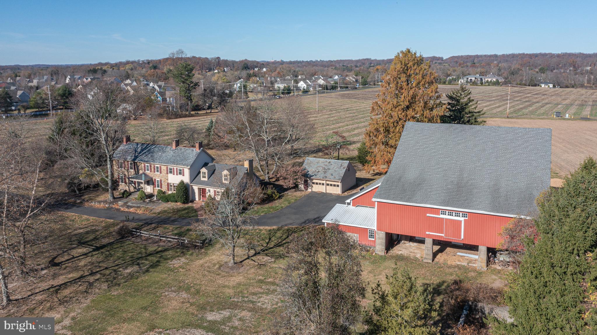 2209 Swamp Road Furlong, PA 18925 - Photo 3 of 59 an aerial view of a house with a yard and lake view