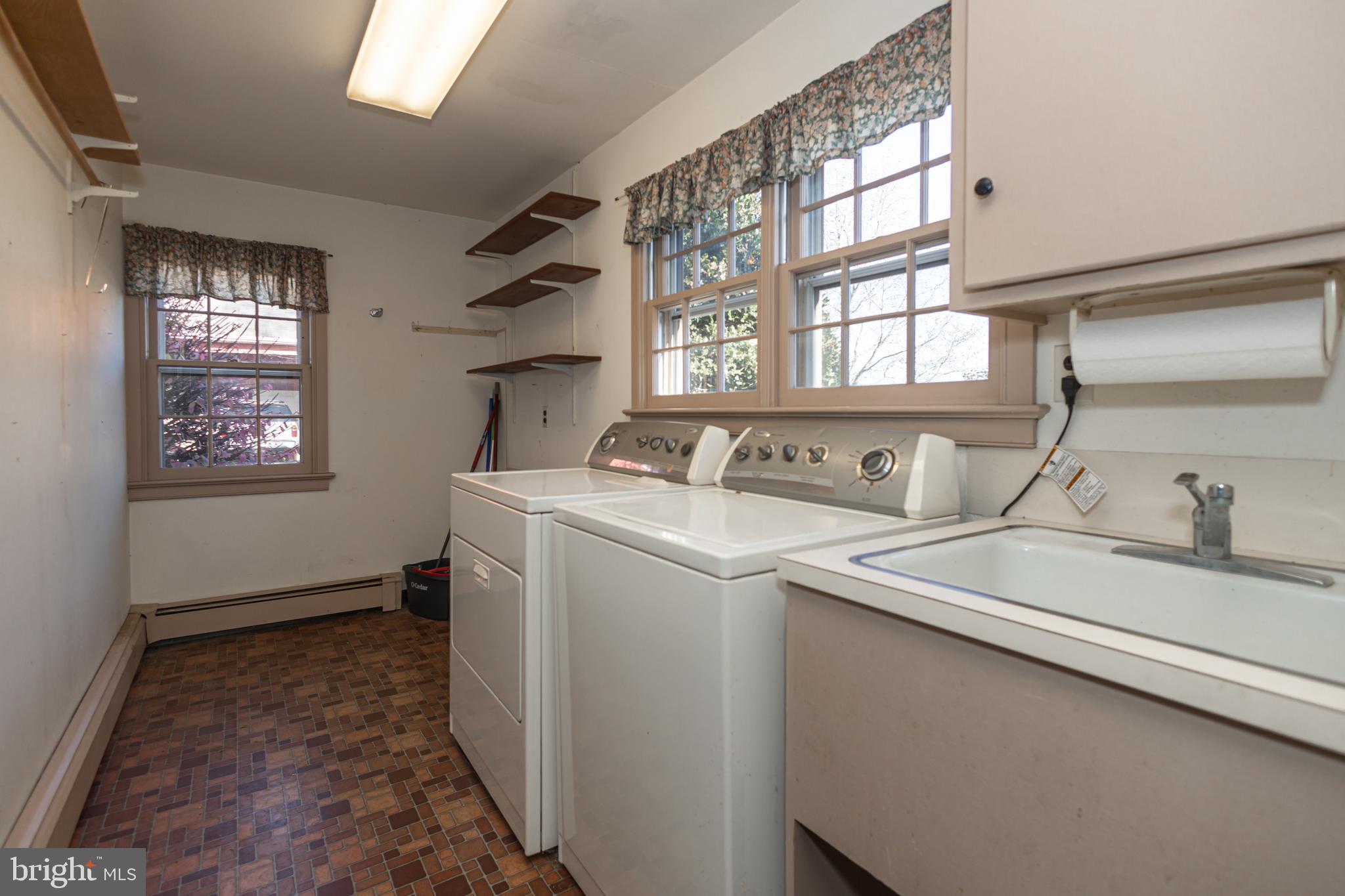 2209 Swamp Road Furlong, PA 18925 - Photo 34 of 59 a utility room with dryer and washer