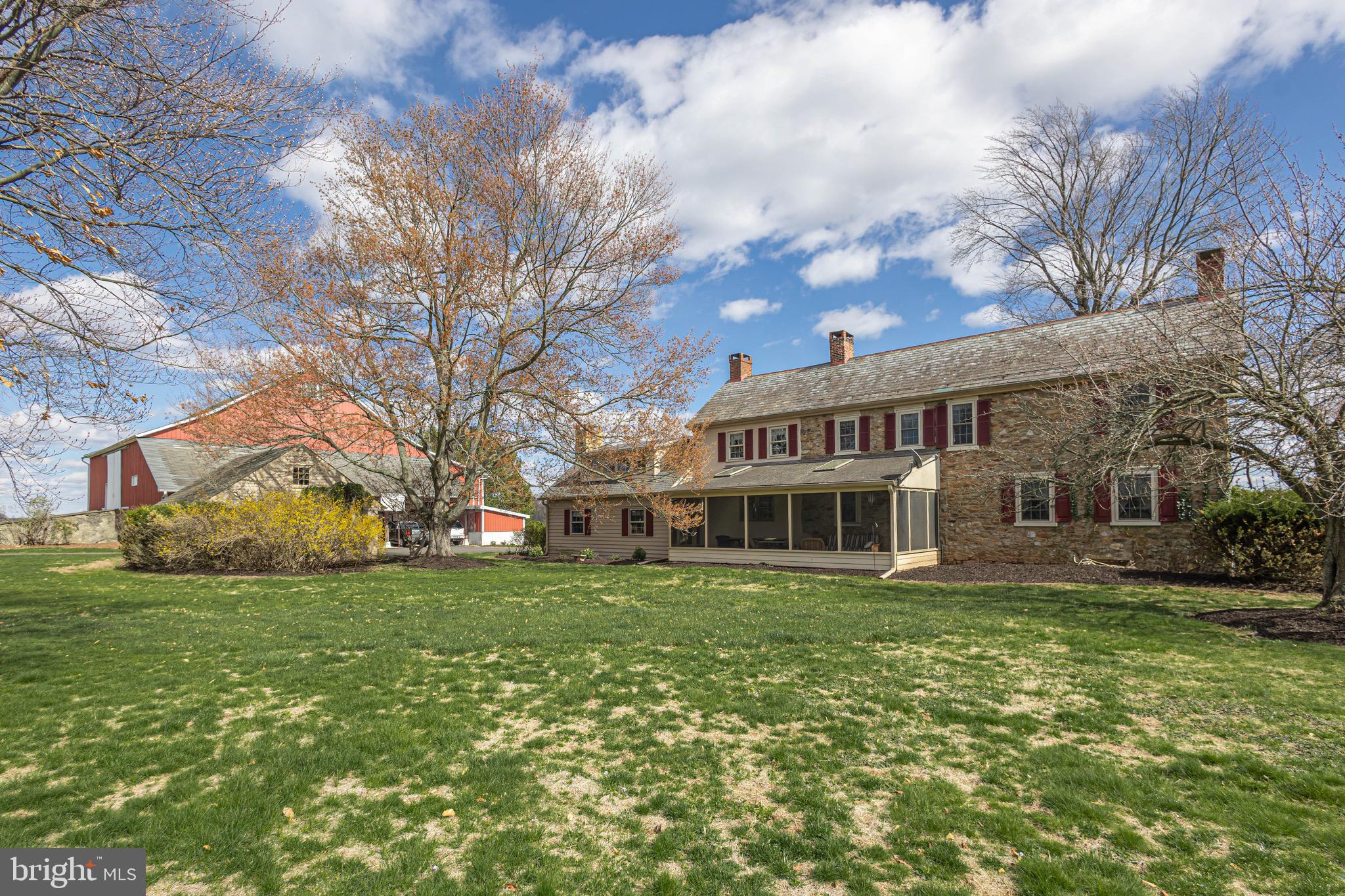 2209 Swamp Road Furlong, PA 18925 - Photo 45 of 59 a view of a house with a big yard and large trees