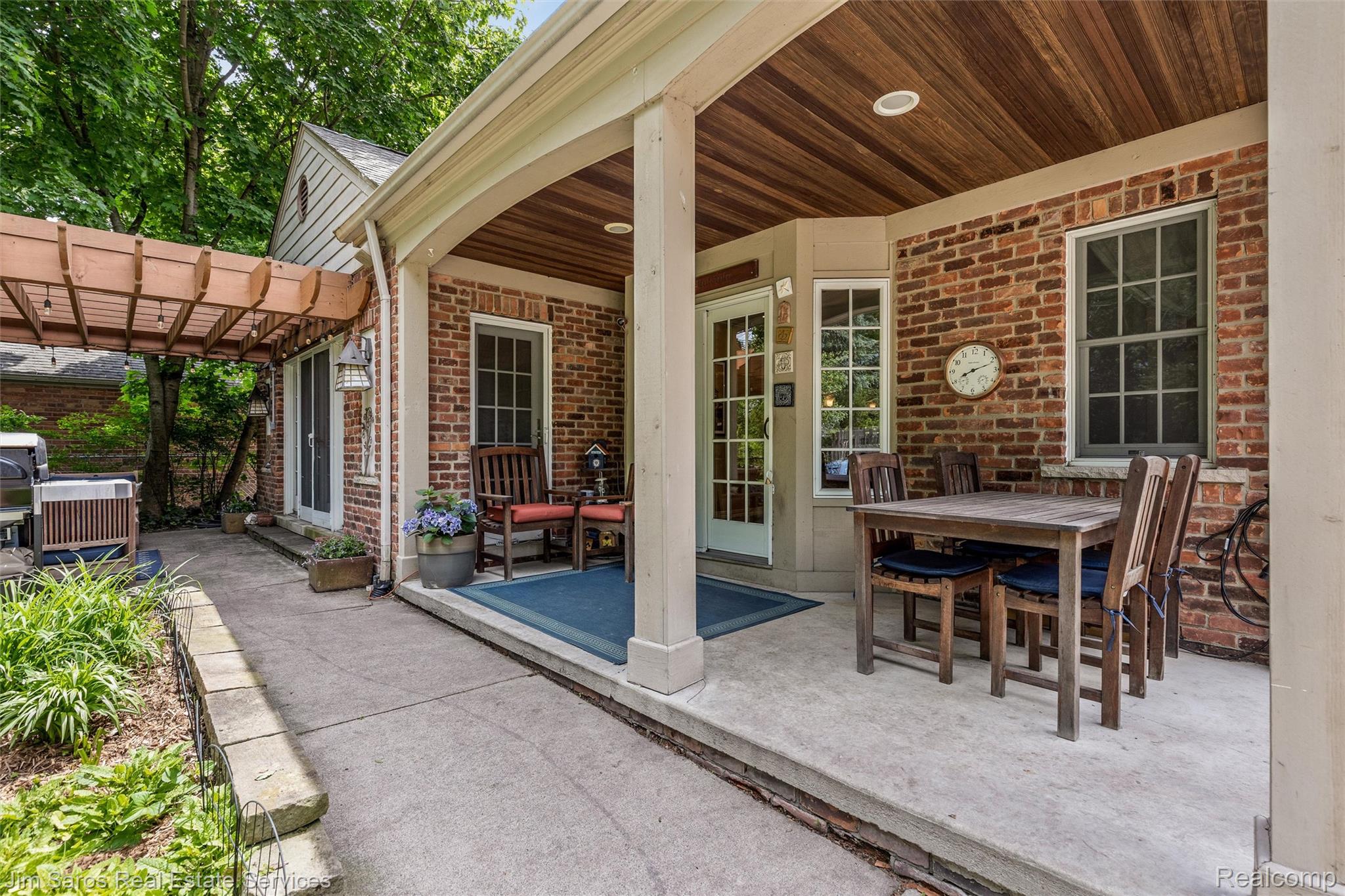 820 Westchester Road Grosse Pointe, MI 48230 - Photo 27 of 33 View of patio featuring a pergola and outdoor dining area