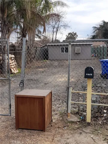 a front view of a house with parking
