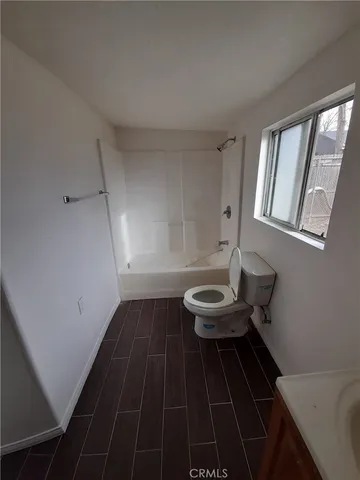 a bathroom with a sink and a toilet