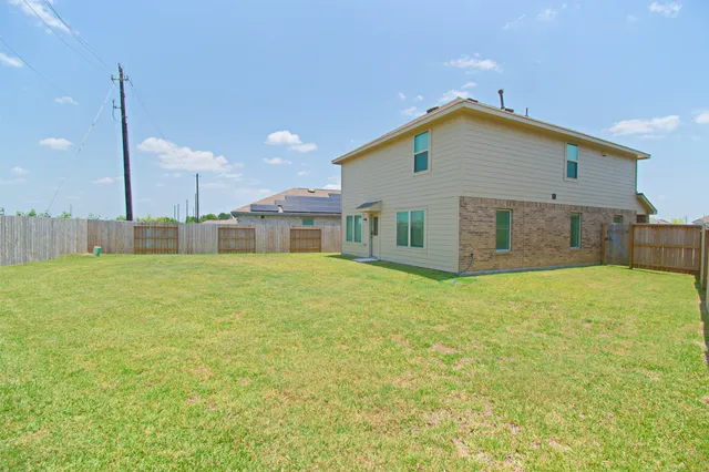 a house view with a outdoor space