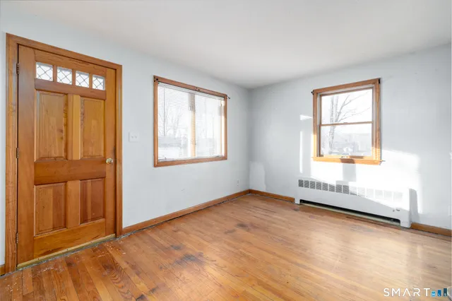 an empty room with windows