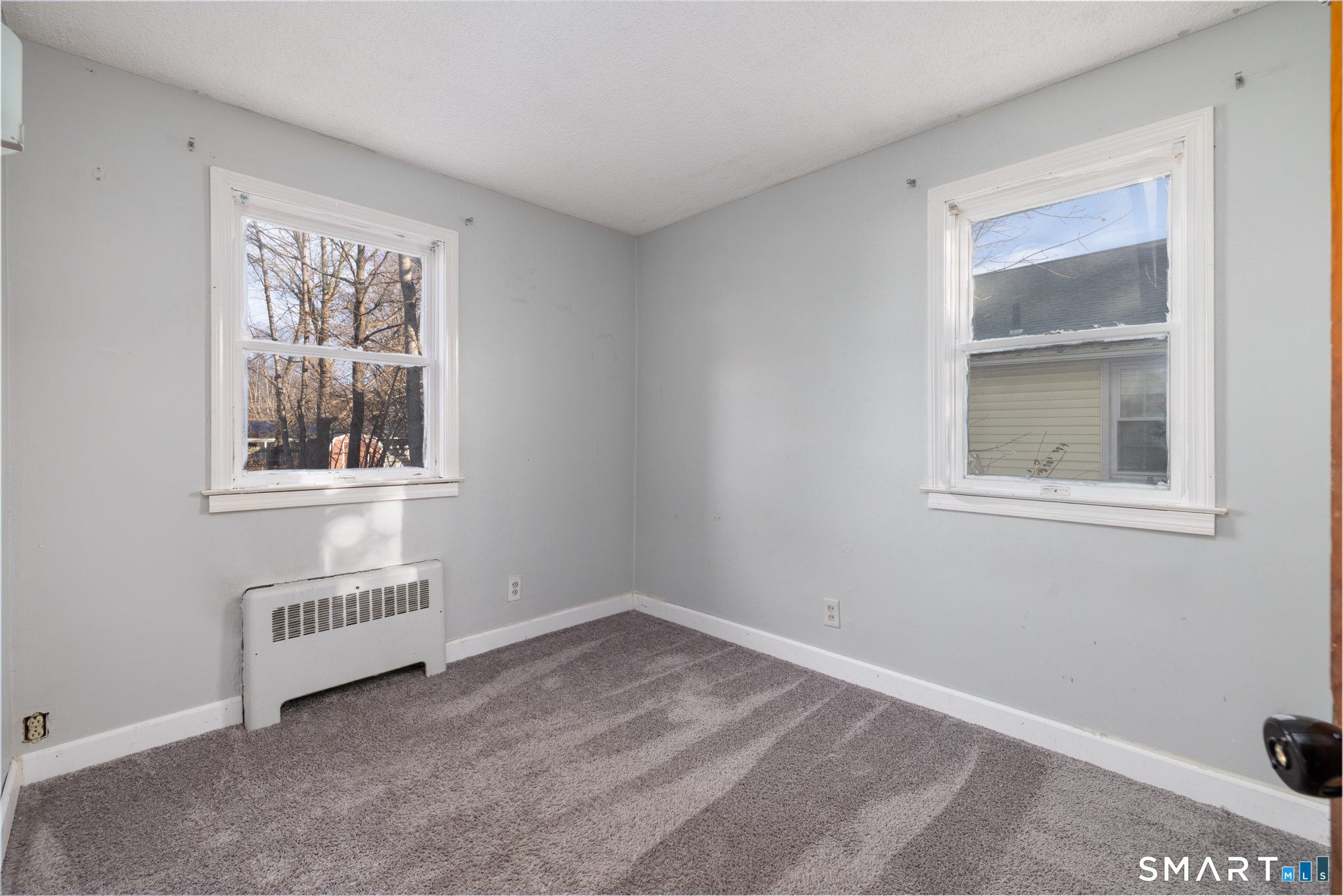 3 Sandra Street Bristol, CT 06010 - Photo 16 of 31 a room that has a window in it