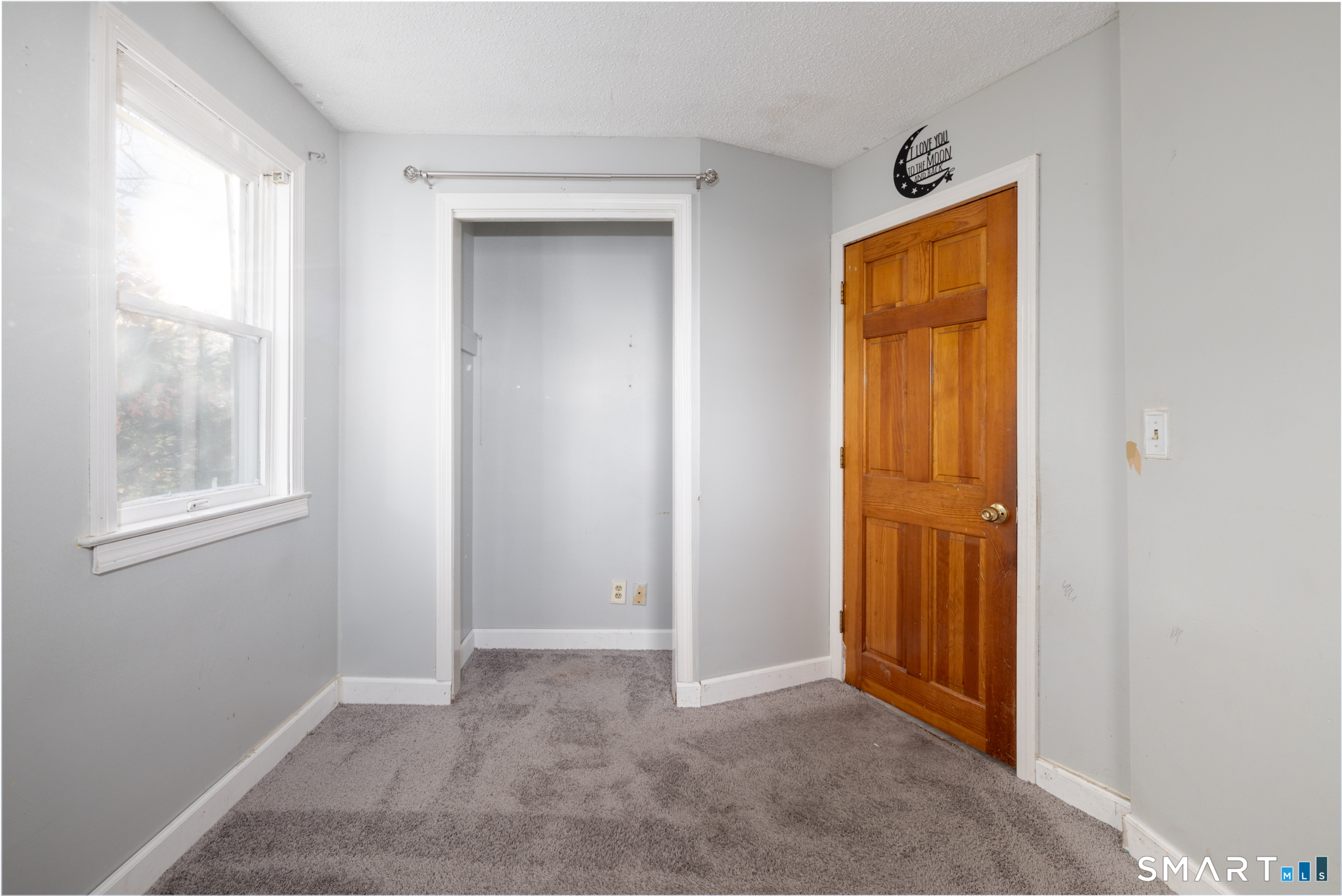 3 Sandra Street Bristol, CT 06010 - Photo 17 of 31 an empty room with windows and closet
