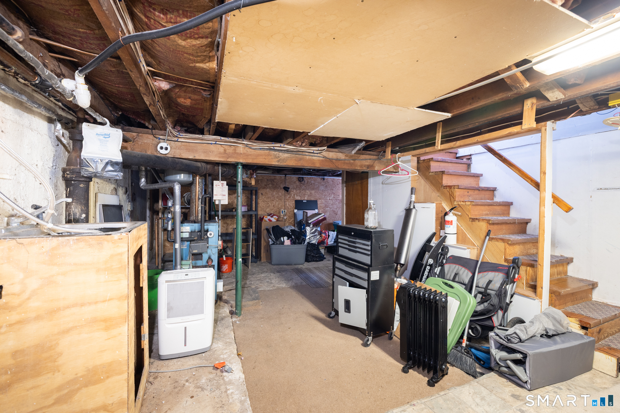 3 Sandra Street Bristol, CT 06010 - Photo 26 of 31 a view of a storage room with furniture