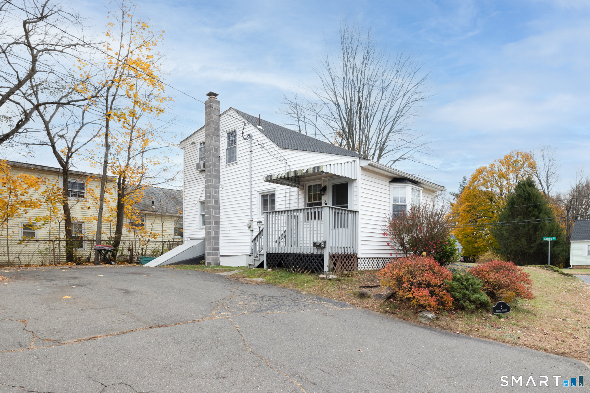 3 Sandra Street Bristol, CT 06010 - Photo 5 of 31 a front view of a house with a yard and garage