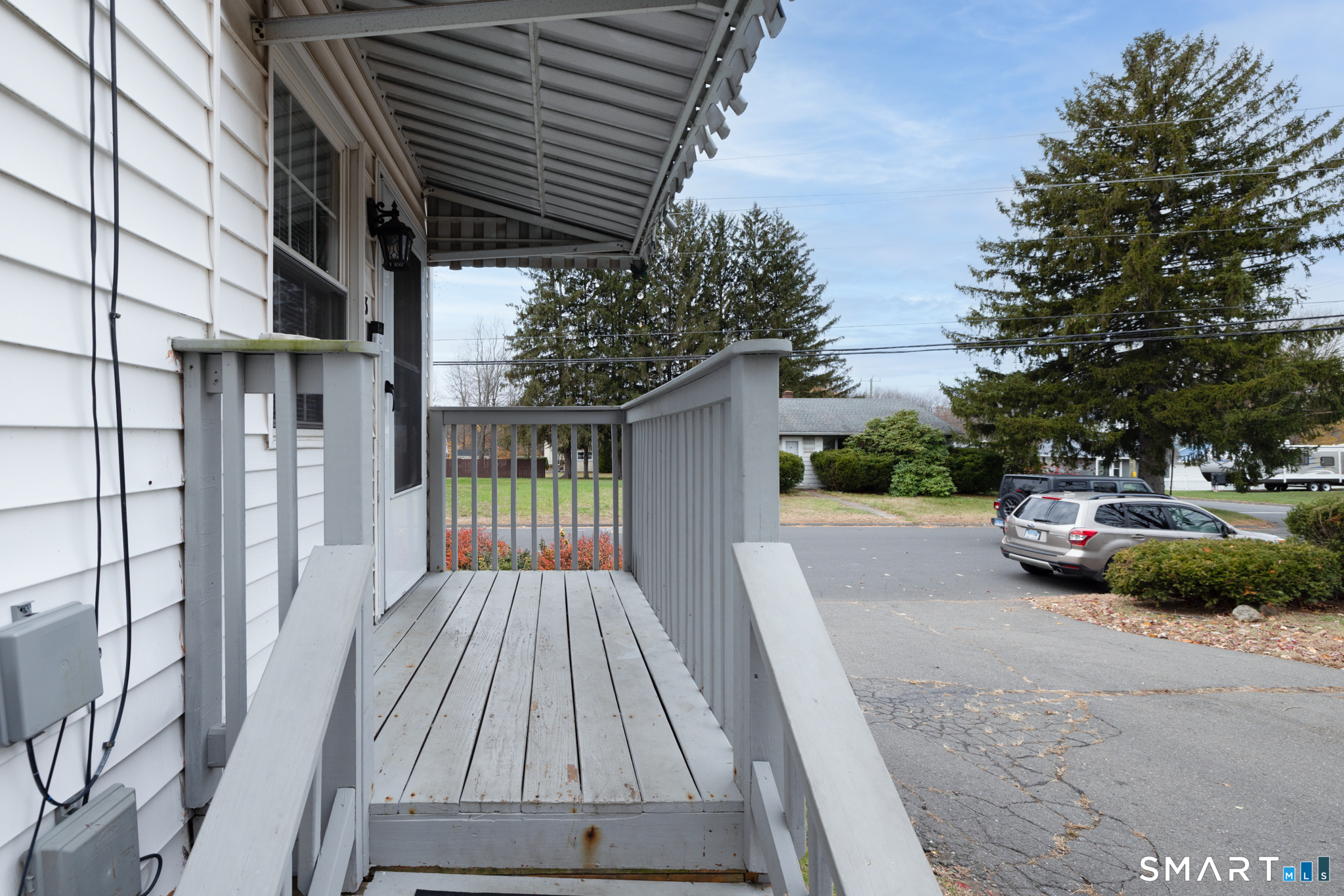 3 Sandra Street Bristol, CT 06010 - Photo 6 of 31 a view of backyard with deck and outdoor seating