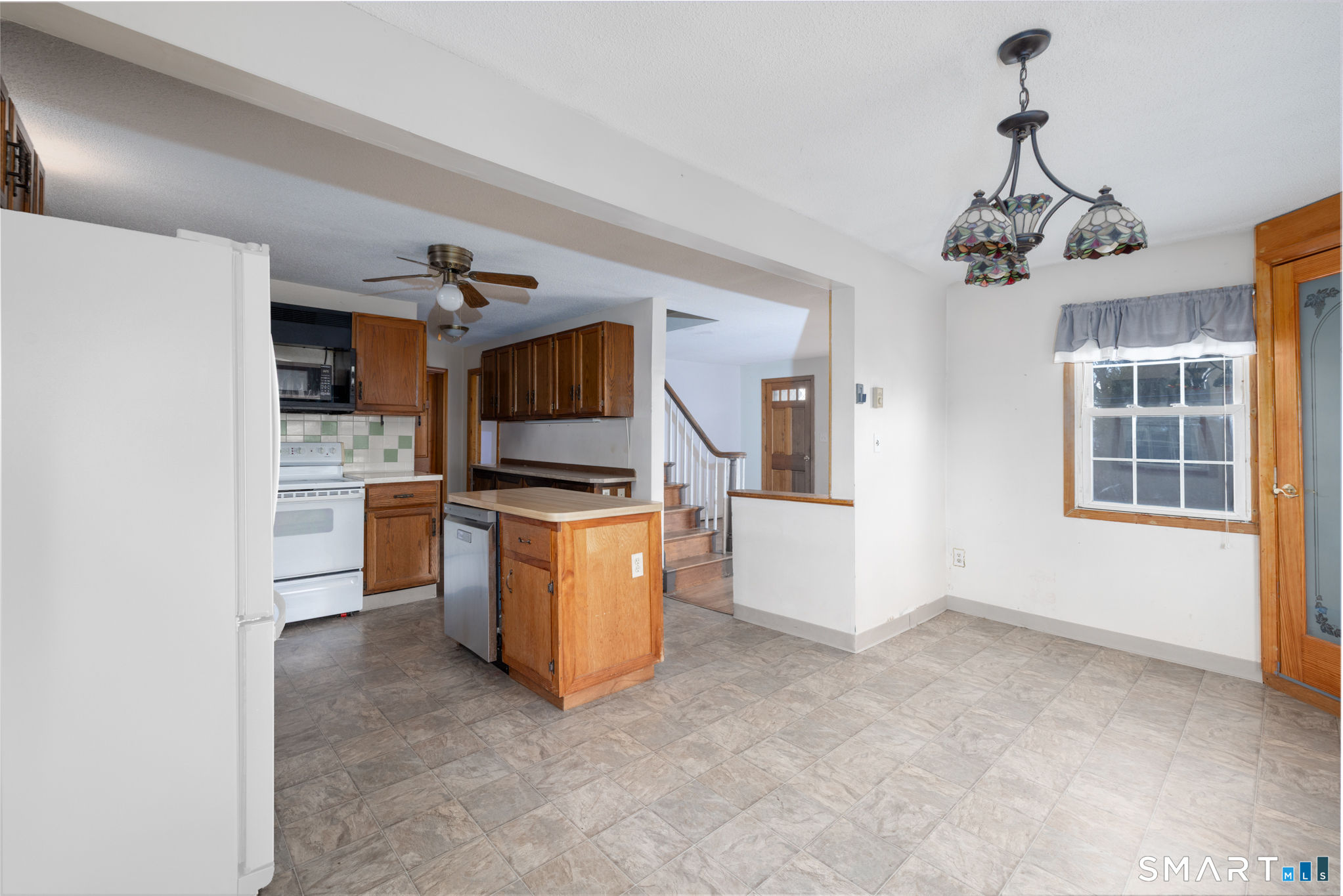 3 Sandra Street Bristol, CT 06010 - Photo 7 of 31 a view of kitchen and windows