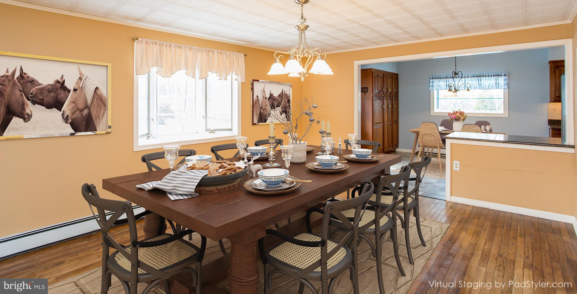 242 South Sugan Road New Hope, PA 18938 - Photo 17 of 35 a view of a dining room with furniture window and wooden floor
