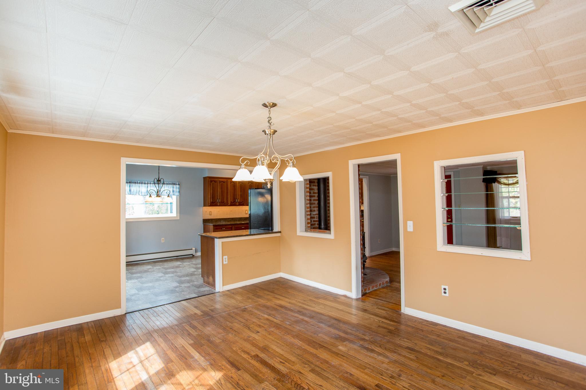 242 South Sugan Road New Hope, PA 18938 - Photo 19 of 35 wooden floor in an empty room with a window