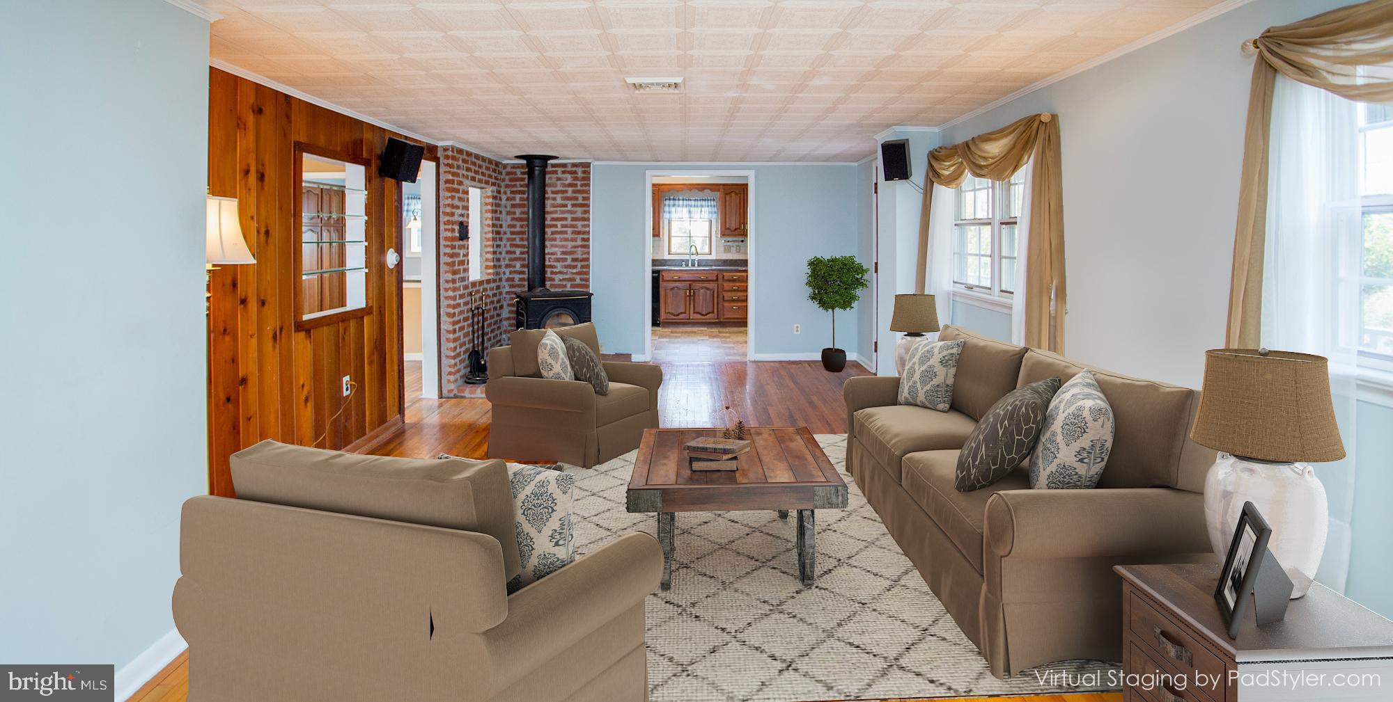 242 South Sugan Road New Hope, PA 18938 - Photo 7 of 35 a living room with furniture and a large window