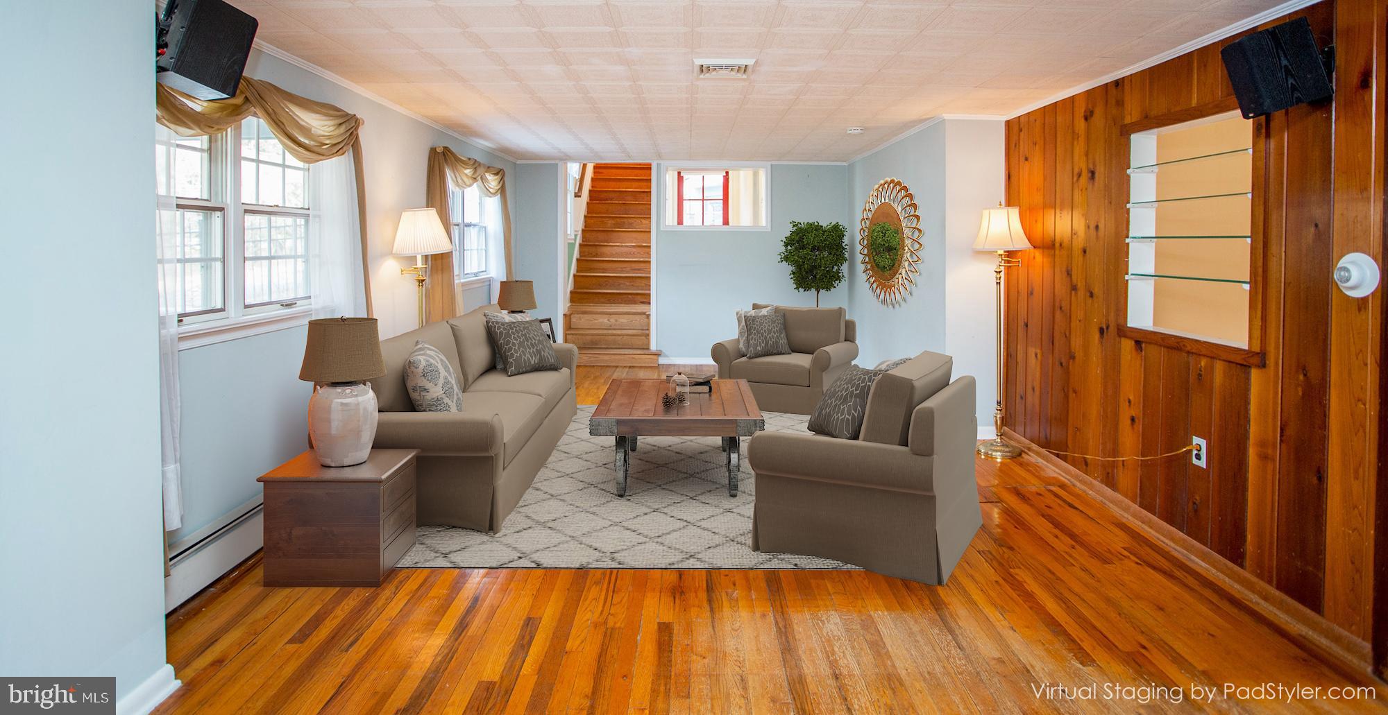 242 South Sugan Road New Hope, PA 18938 - Photo 9 of 35 a living room with furniture and a fireplace