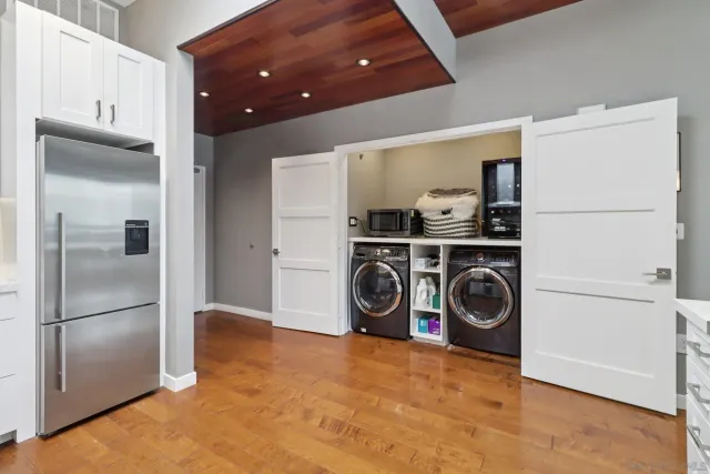 a utility room with dryer and washer