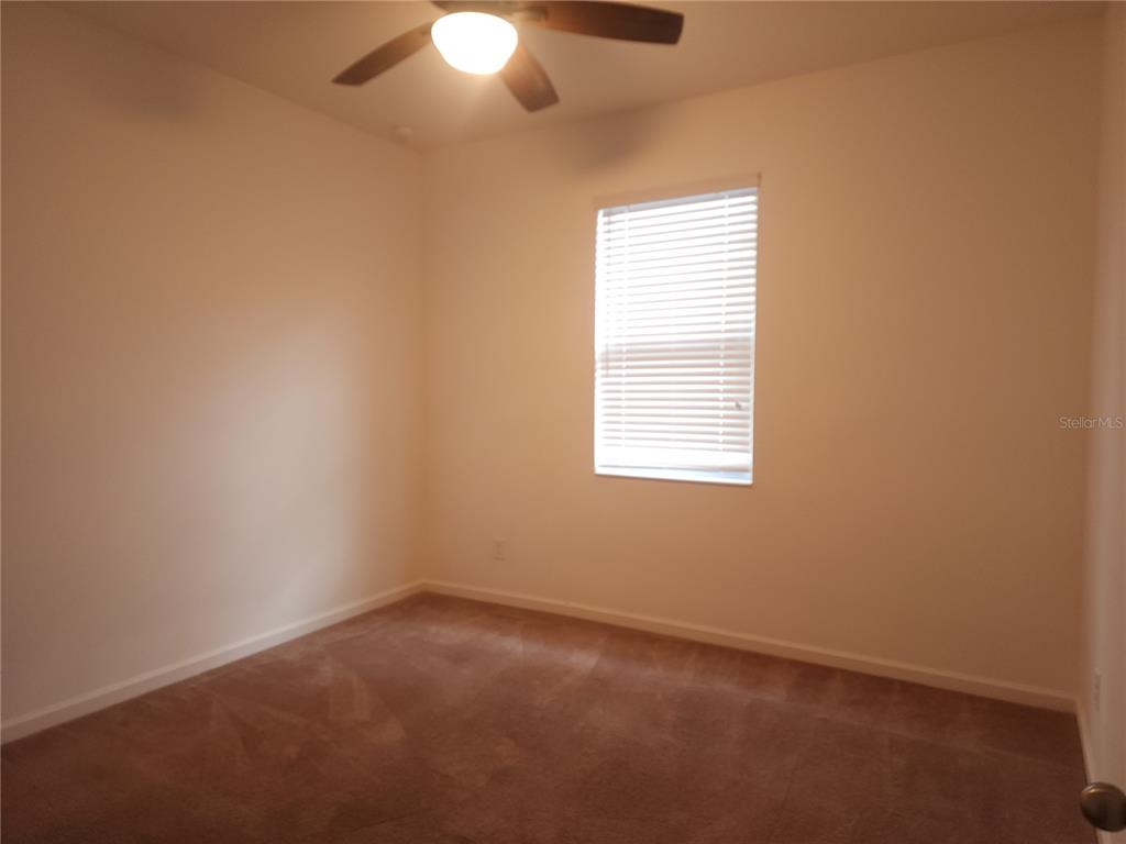 3230 Stratton Circle Kissimmee, FL 34744 - Photo 19 of 28 an empty room with a window