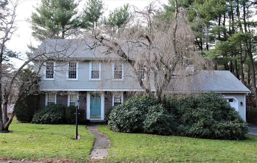 21 Casey Street Canton, MA 02021 - Photo 3 of 29 a front view of a house with a yard and trees