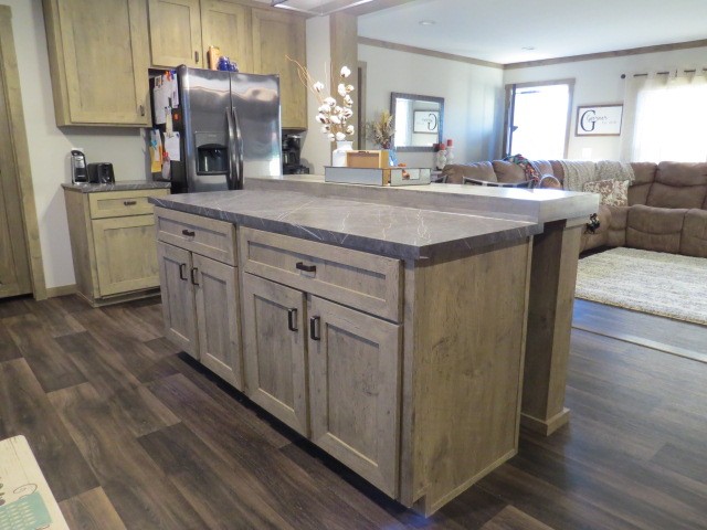 273 Miller Lane Goodspring, TN 38460 - Photo 11 of 42 a kitchen with sink cabinets and wooden floor