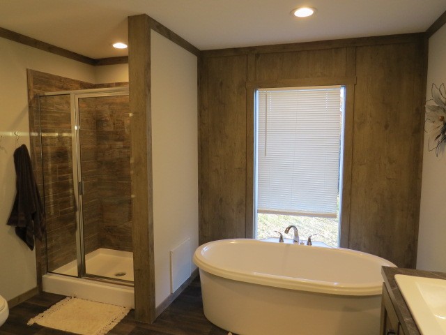 273 Miller Lane Goodspring, TN 38460 - Photo 17 of 42 a bathroom with a toilet a sink and shower