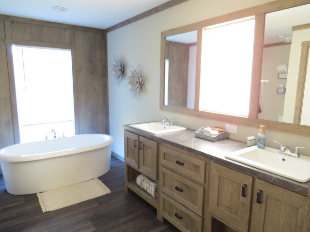 273 Miller Lane Goodspring, TN 38460 - Photo 18 of 42 a spacious bathroom with a double vanity sink mirror and toilet