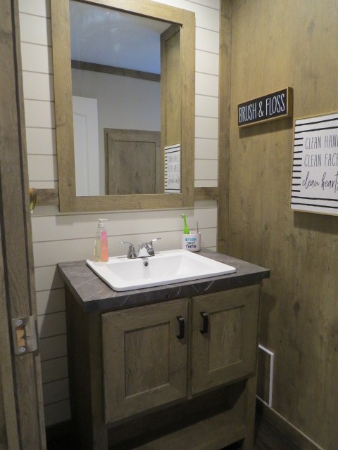 273 Miller Lane Goodspring, TN 38460 - Photo 21 of 42 a bathroom with a sink and a mirror