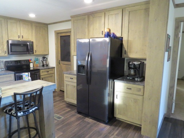 273 Miller Lane Goodspring, TN 38460 - Photo 8 of 42 a kitchen with stainless steel appliances a refrigerator stove and microwave