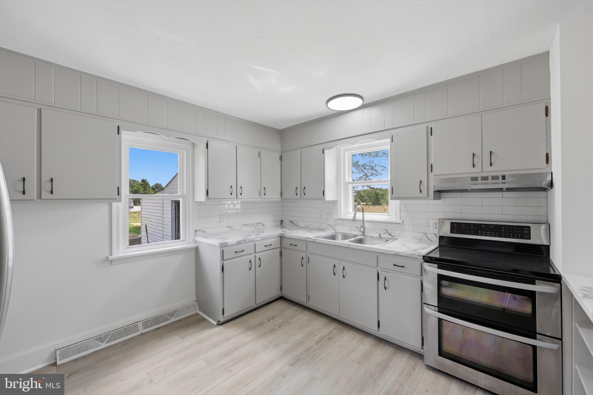 8251 Marshall Corner Road Pomfret, MD 20675 - Photo 5 of 20 Bright and modern kitchen space.