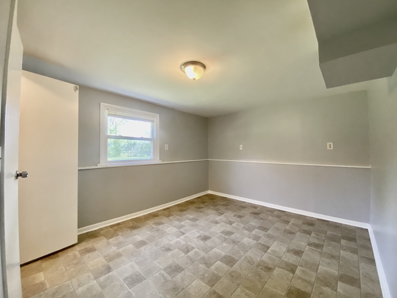 3324 Laurel Lane Hazel Crest, IL 60429 - Photo 23 of 26 an empty room with a natural light