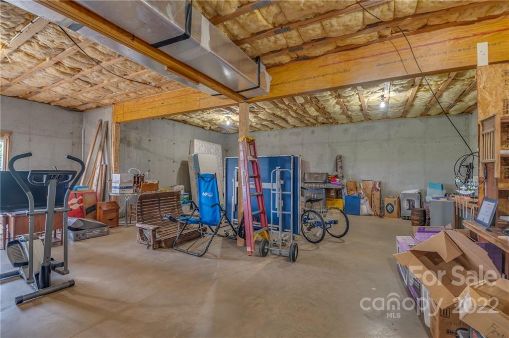 2221 Pea Ridge Road Mill Spring, NC 28756 - Photo 39 of 48 a view of a room with gym equipment