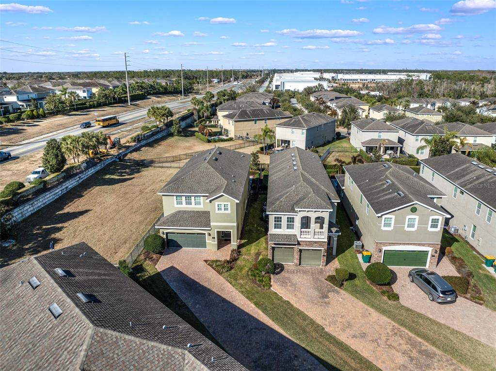 180 Minton Loop Kissimmee, FL 34747 - Photo 3 of 49 an aerial view of residential houses with outdoor space