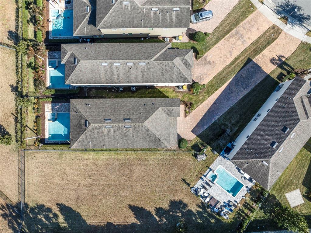 180 Minton Loop Kissimmee, FL 34747 - Photo 4 of 49 a view of a swimming pool with a patio