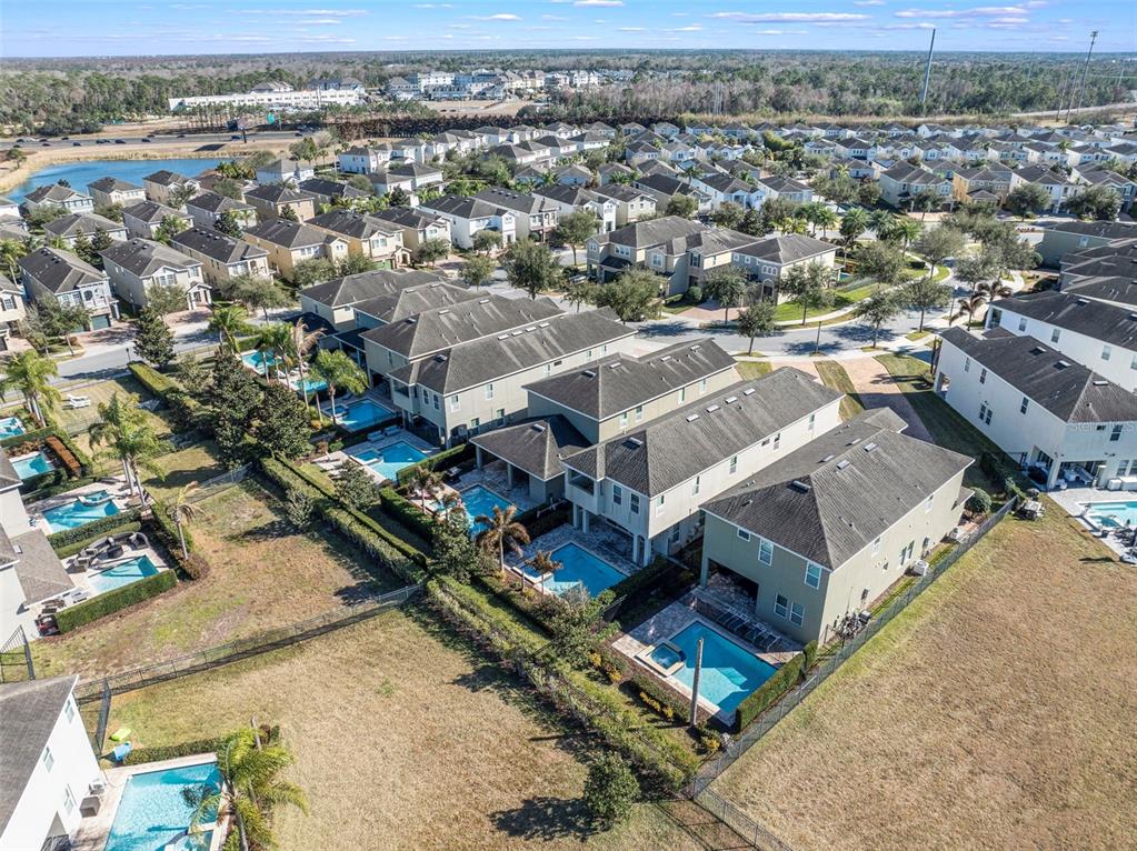 180 Minton Loop Kissimmee, FL 34747 - Photo 6 of 49 an aerial view of a house with a yard