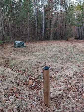 a sign board with empty pole