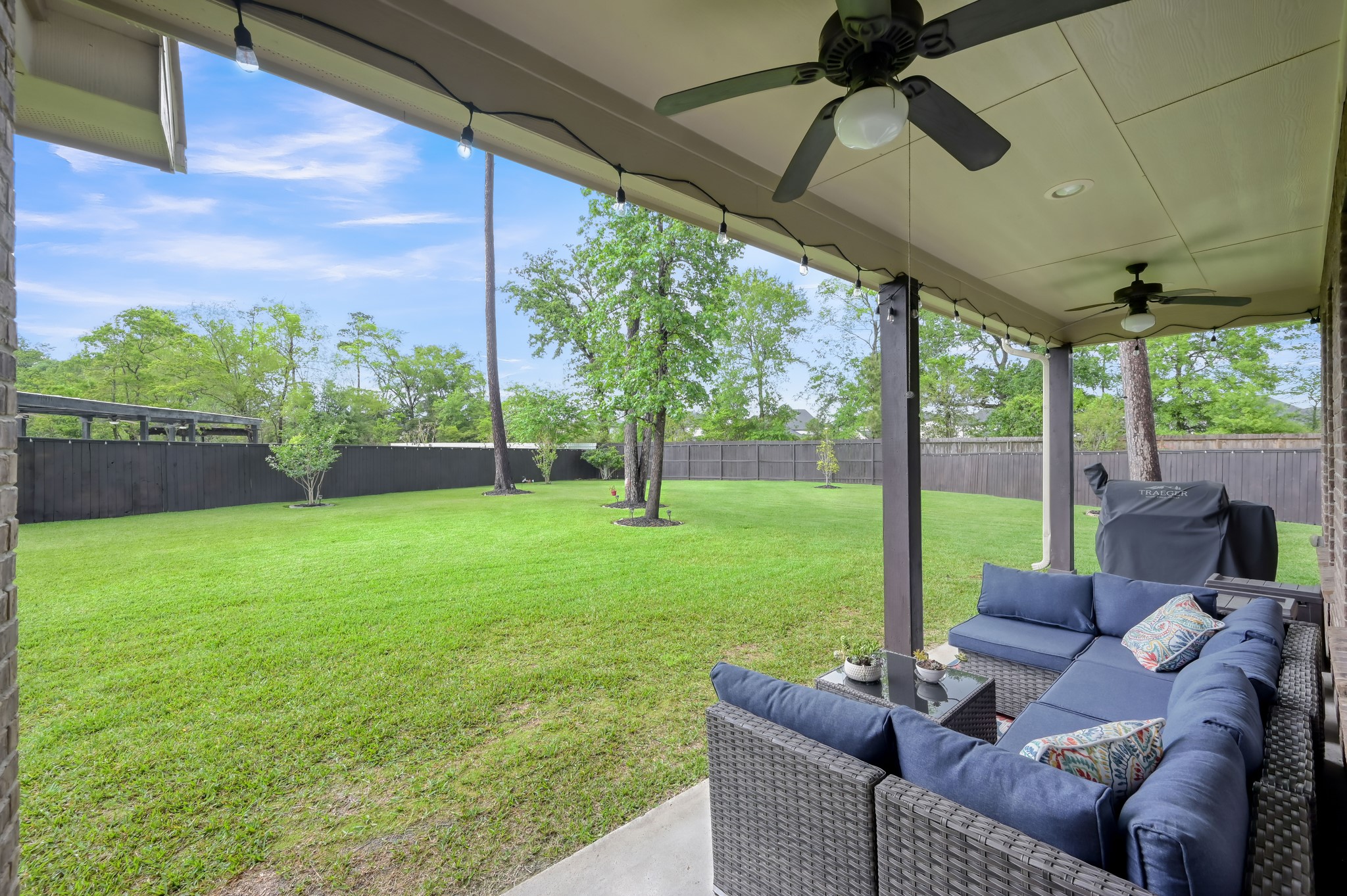 23 Rancher's Trail Tomball, TX 77375 - Photo 37 of 40 While enjoying this yard, you can sit under a covered patio.