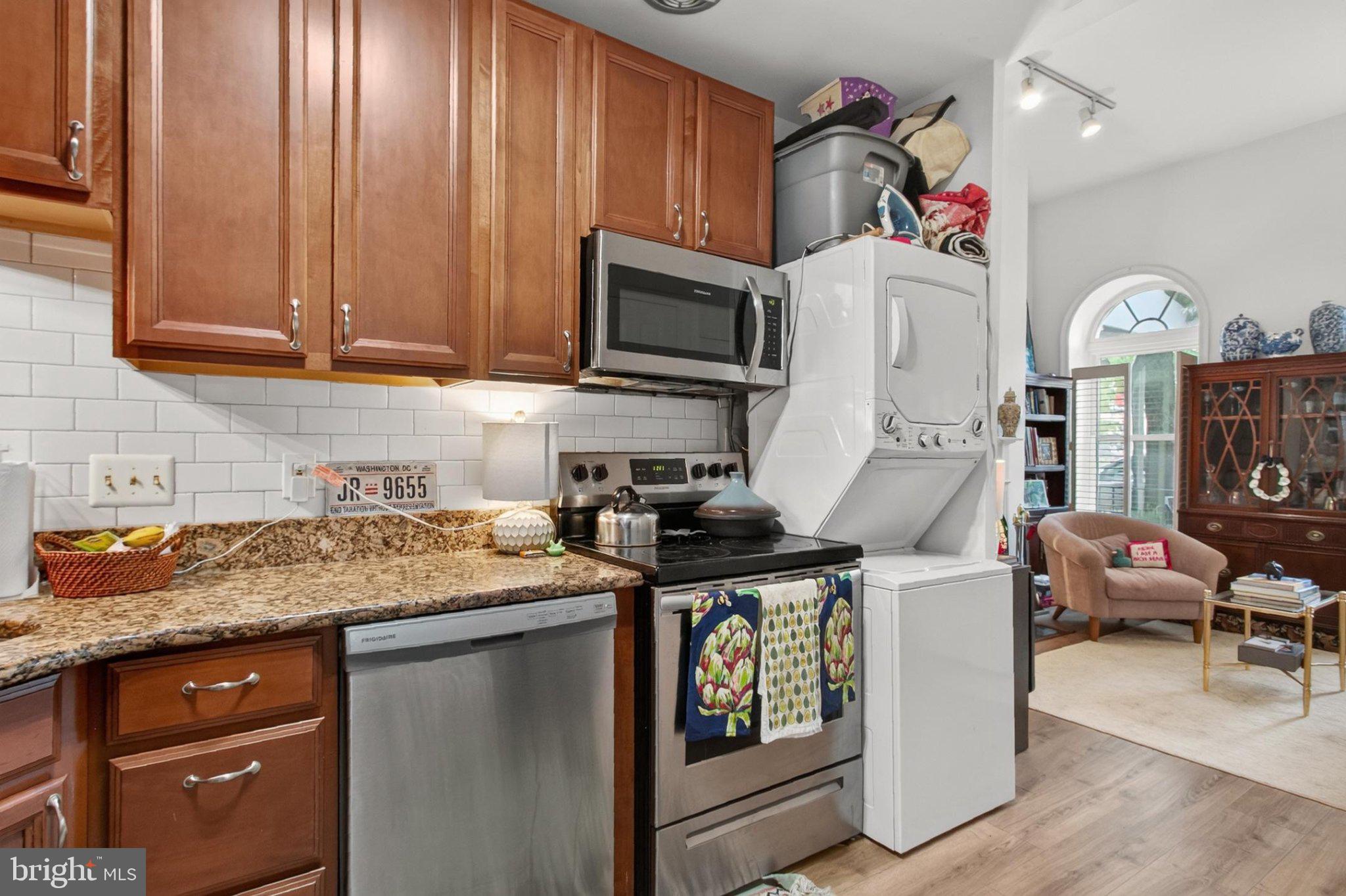 738 11th Street Northeast, Unit 1 Washington, DC 20002 - Photo 13 of 21 Cozy kitchen with modern finishes.