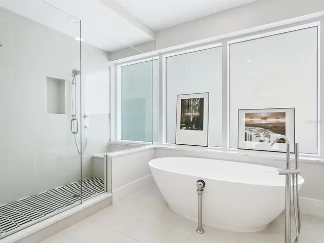 a utility room with sink dryer and washer