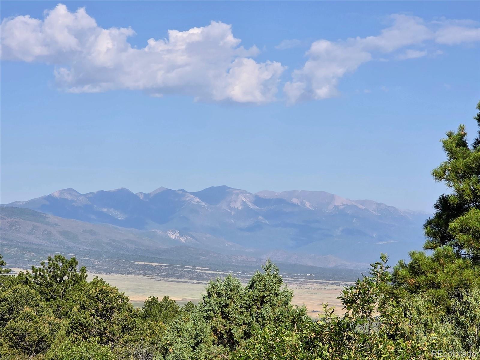 781 Ridgeway Road Cotopaxi, CO 81223 - Photo 17 of 42 an aerial view of houses covered in trees