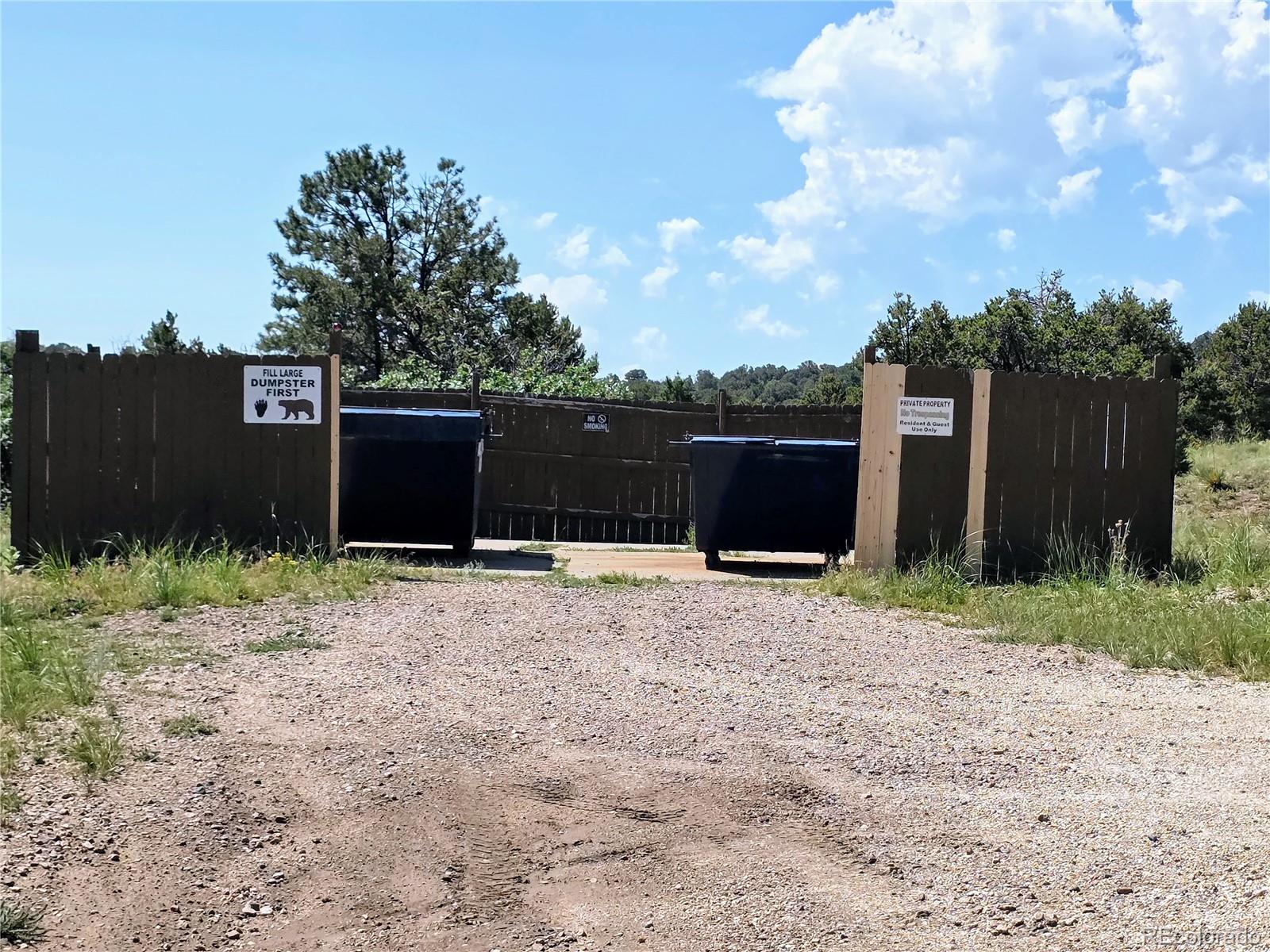 781 Ridgeway Road Cotopaxi, CO 81223 - Photo 31 of 42 a front view of a house with a yard