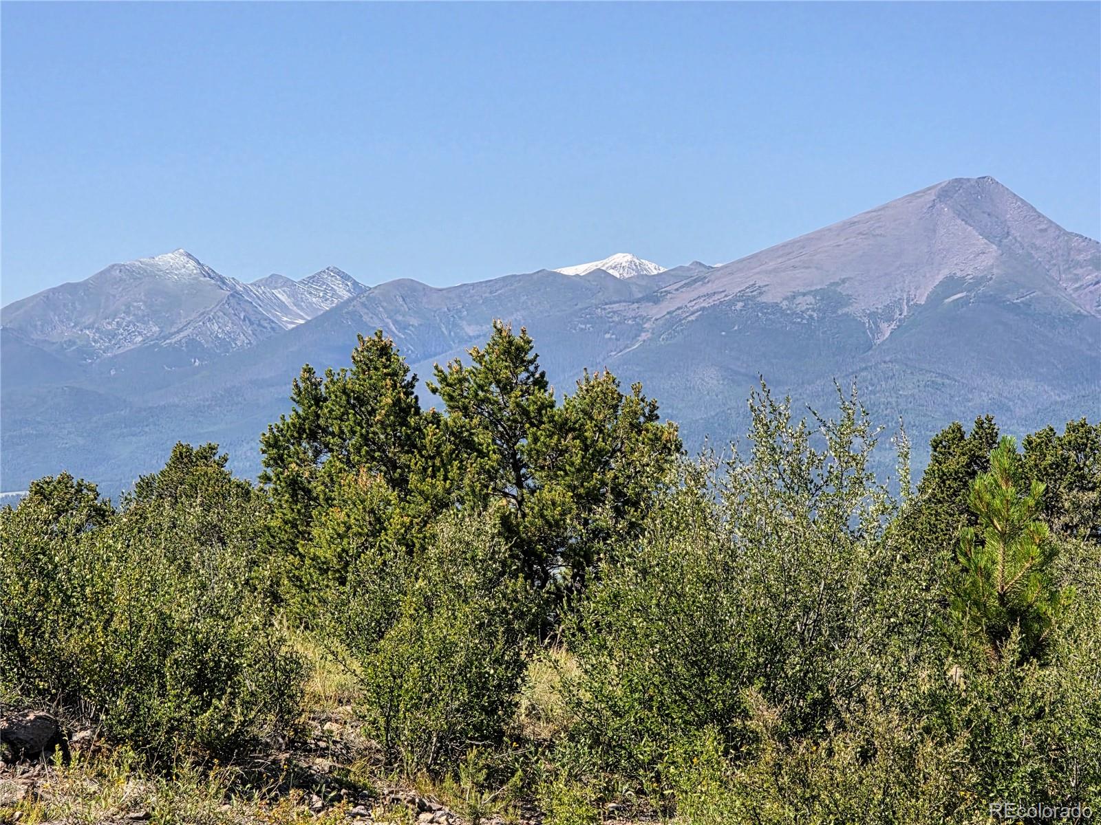 781 Ridgeway Road Cotopaxi, CO 81223 - Photo 5 of 42 a view of a house with a mountain in the background