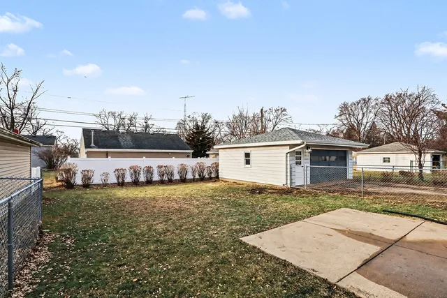 a view of a house with a garden