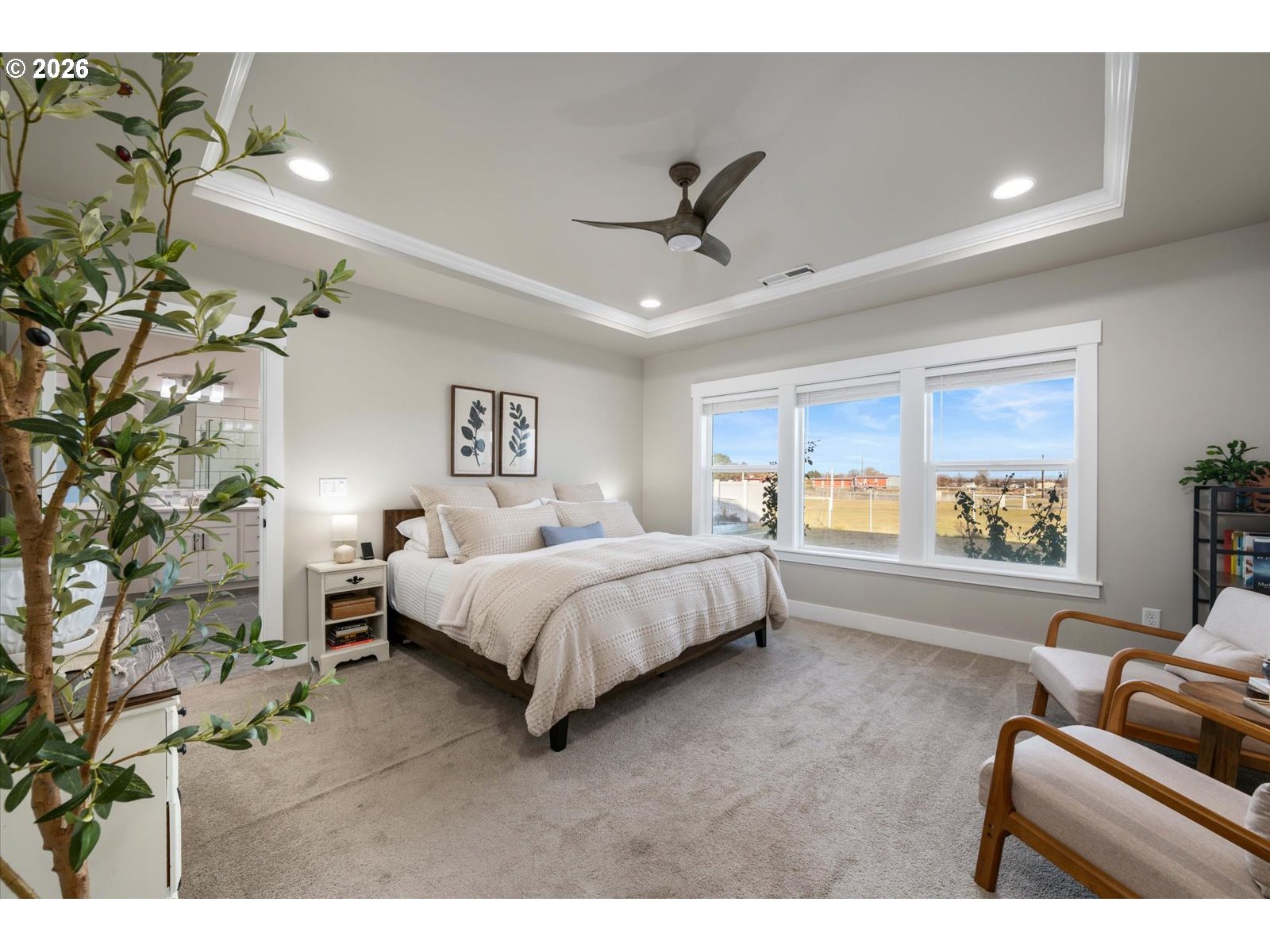 224 Rome Street Boardman, OR 97818 - Photo 12 of 23 a spacious bedroom with a bed window and couch