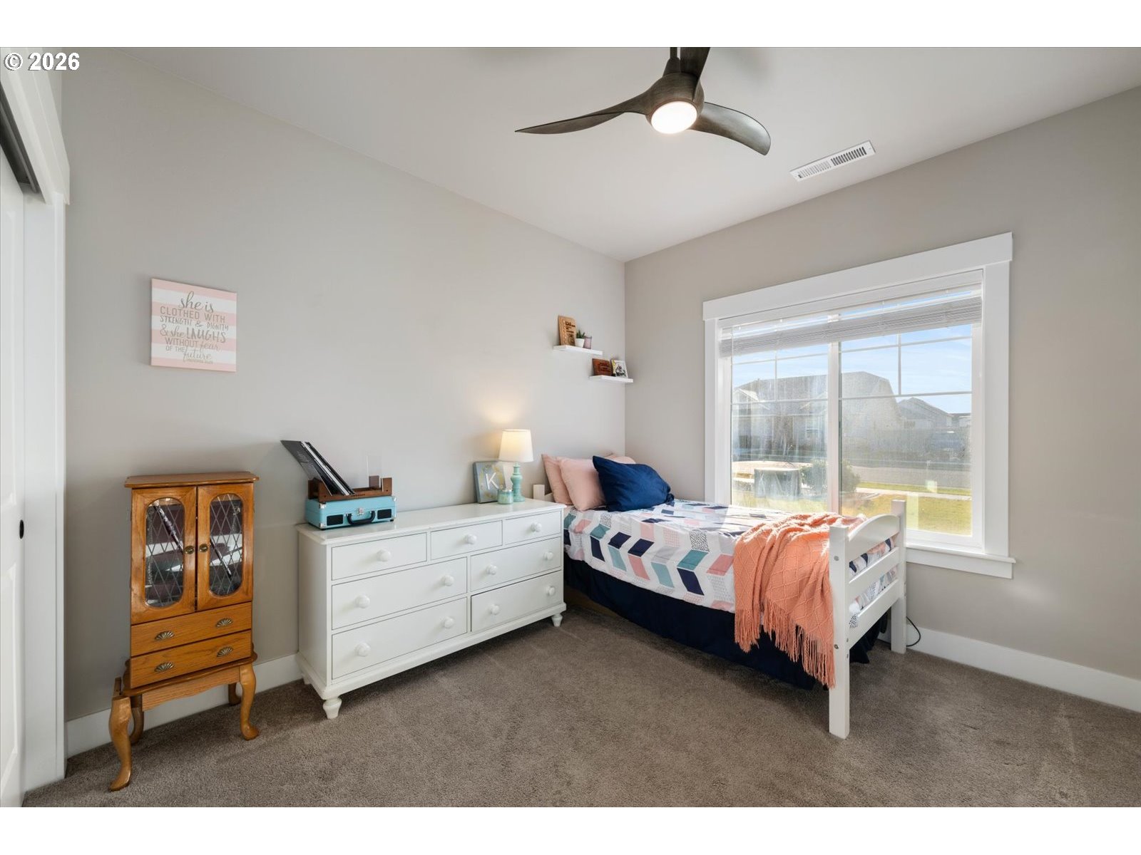 224 Rome Street Boardman, OR 97818 - Photo 17 of 23 a bed room with a bed and a window