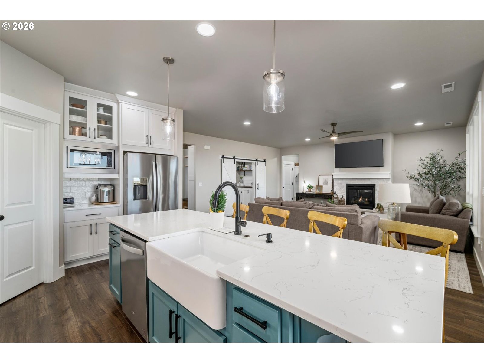 224 Rome Street Boardman, OR 97818 - Photo 8 of 23 a kitchen with stainless steel appliances a sink a stove top oven a counter space and cabinets